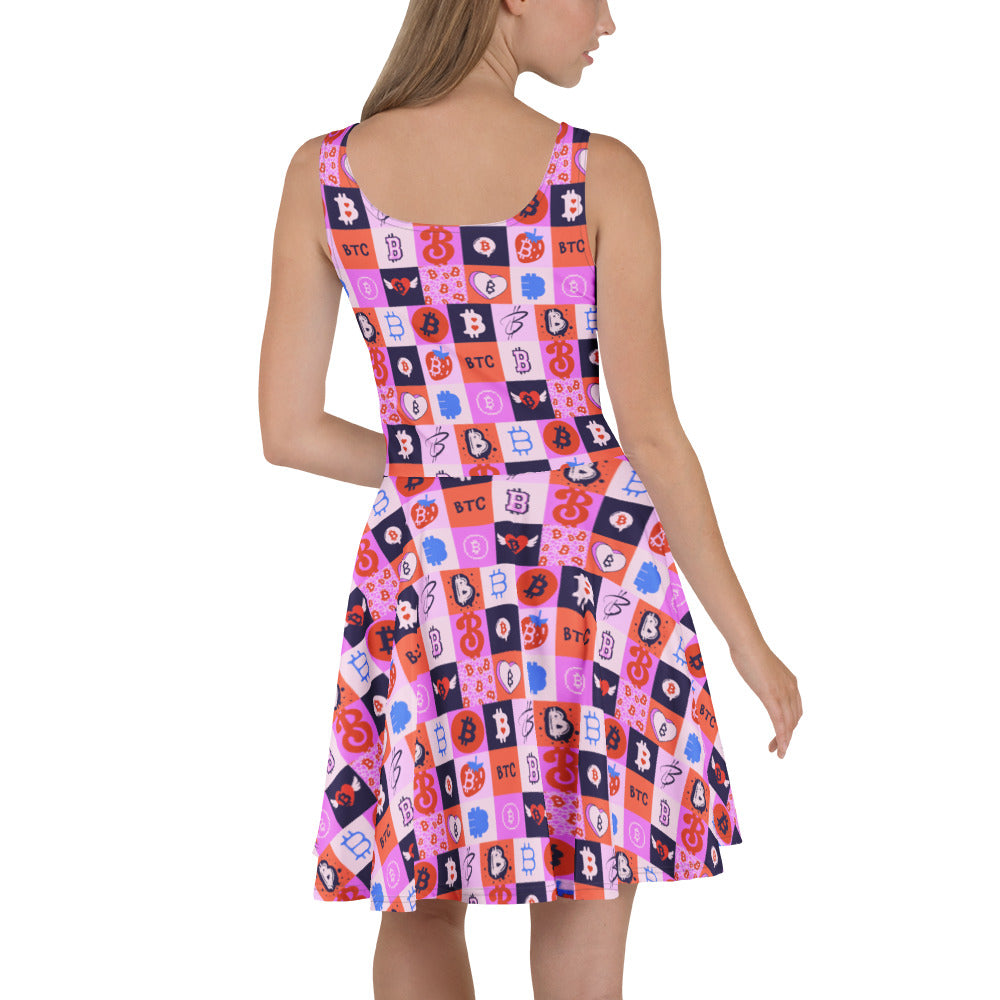 Woman wearing a colorful bitcoin patterned dress on a white background