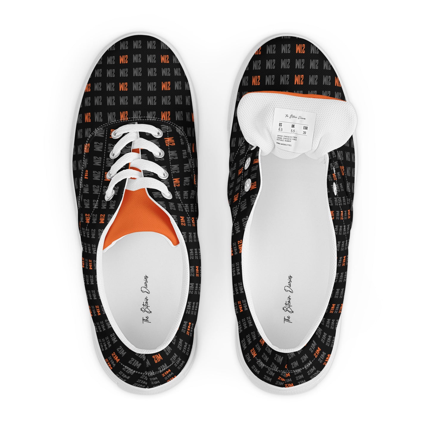 Pair of black 21 million patterned shoes with orange soles on a white background
