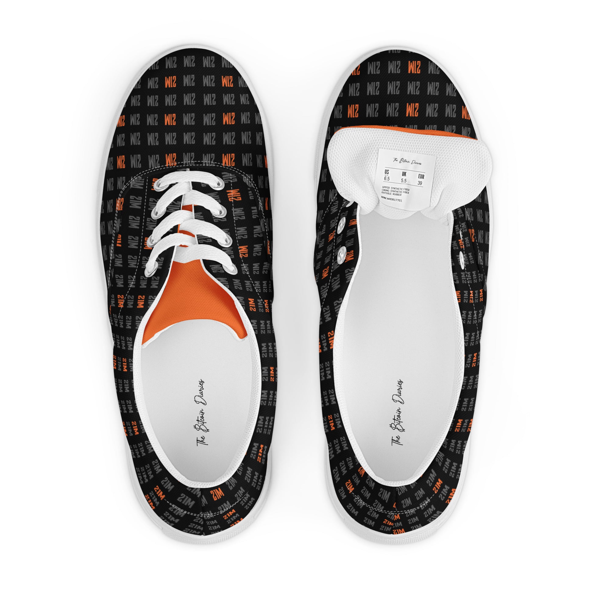 Pair of black 21 million patterned shoes with orange soles on a white background