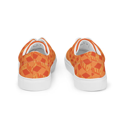 Orange patterned sneakers on a white background