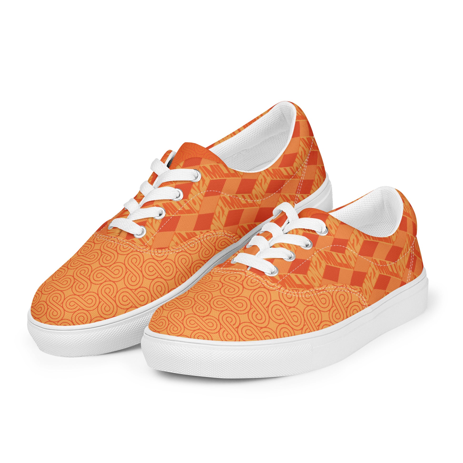 Orange patterned sneakers with white laces on a white background