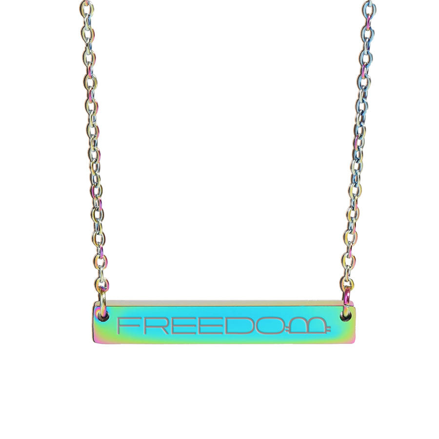 Necklace with a bar pendant engraved with 'FREEDOM' on a white background