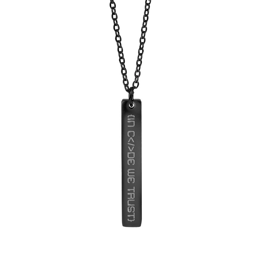 Black rectangular pendant with engraved text in code we trust on a chain against a white background