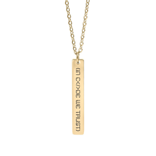 Gold necklace with a bar in code we trust pendant on a white background