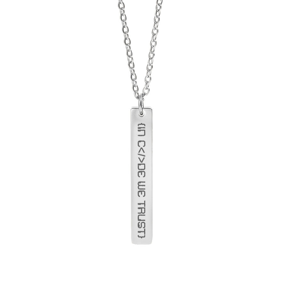 Silver necklace with a rectangular pendant in code we trust on a white background