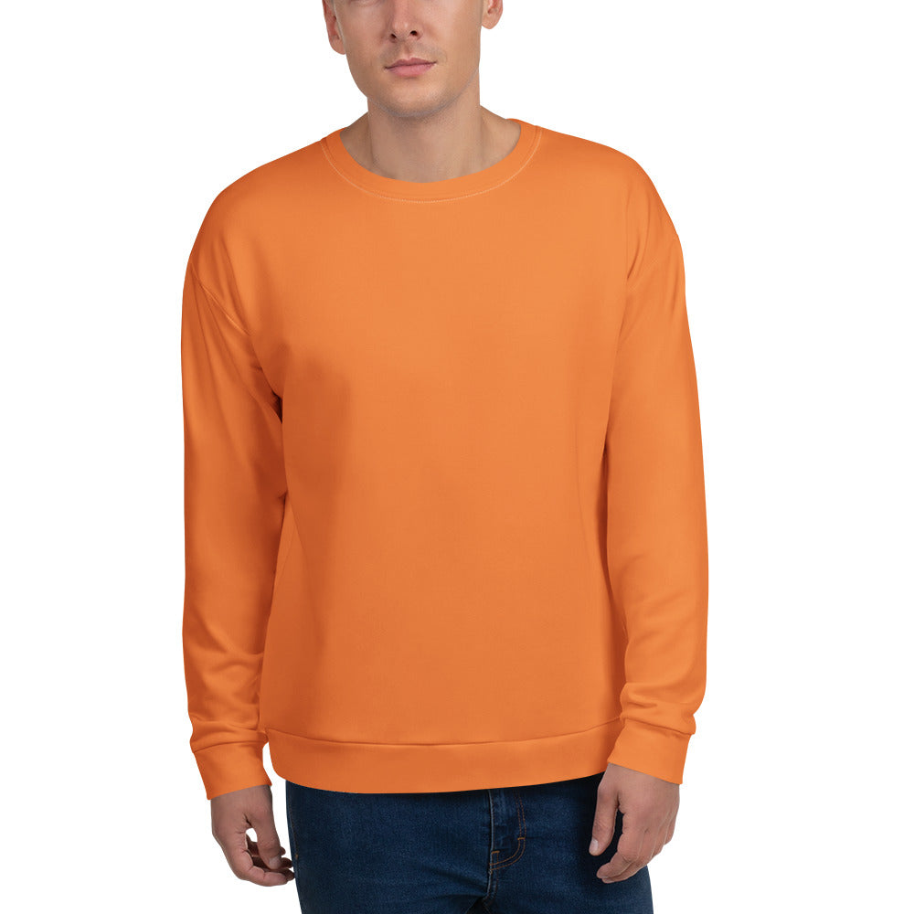 Orange sweatshirt worn by a person on a white background