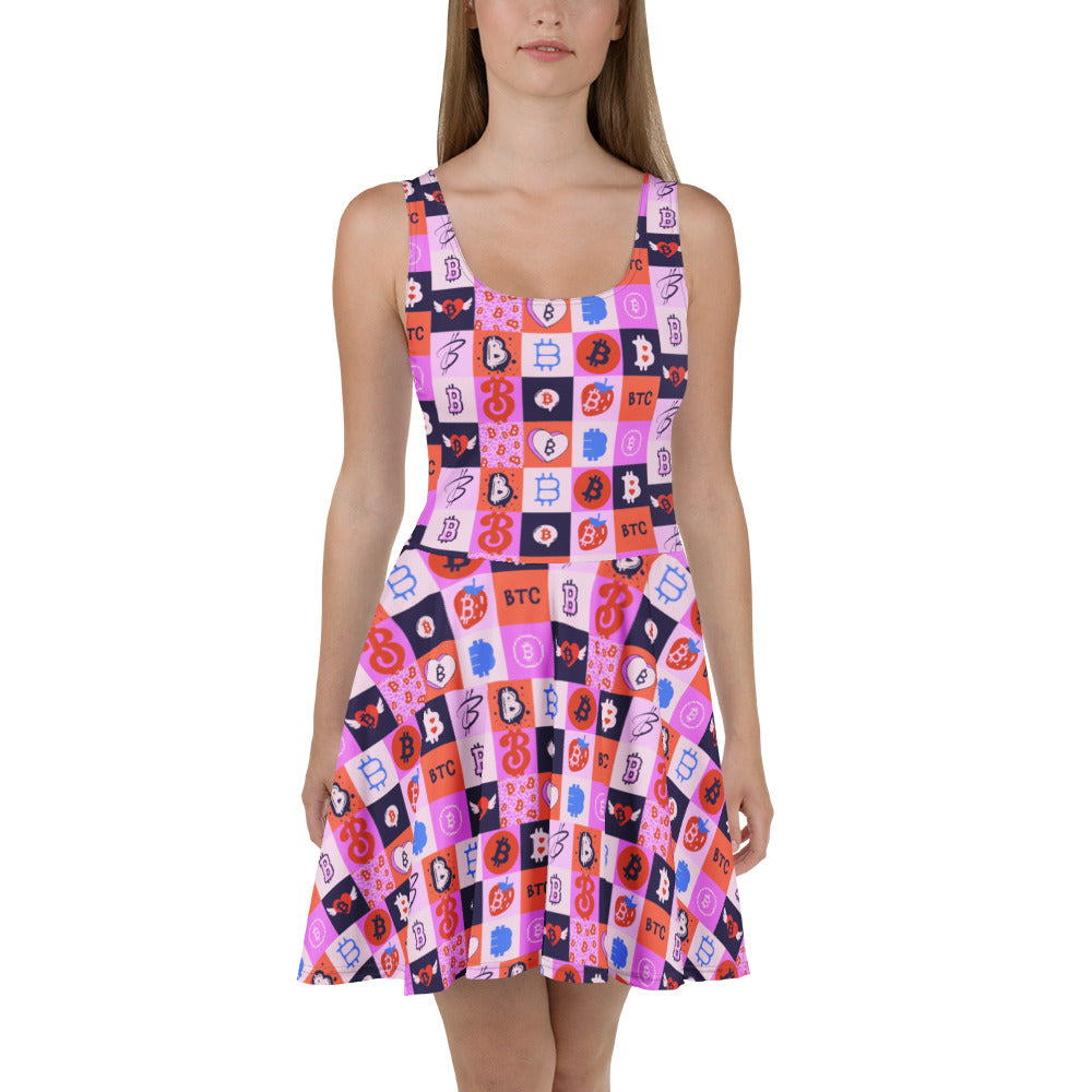 Woman wearing a colorful dress with bitcoin patterned design on a white background