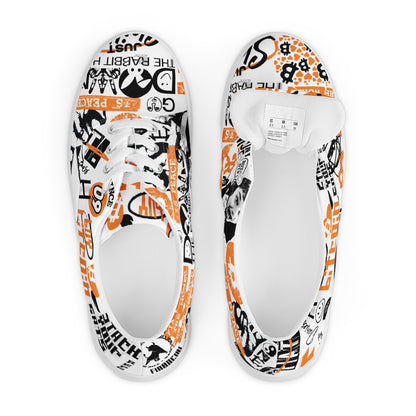 White bitcoin sneakers with black and orange graphics on a white background