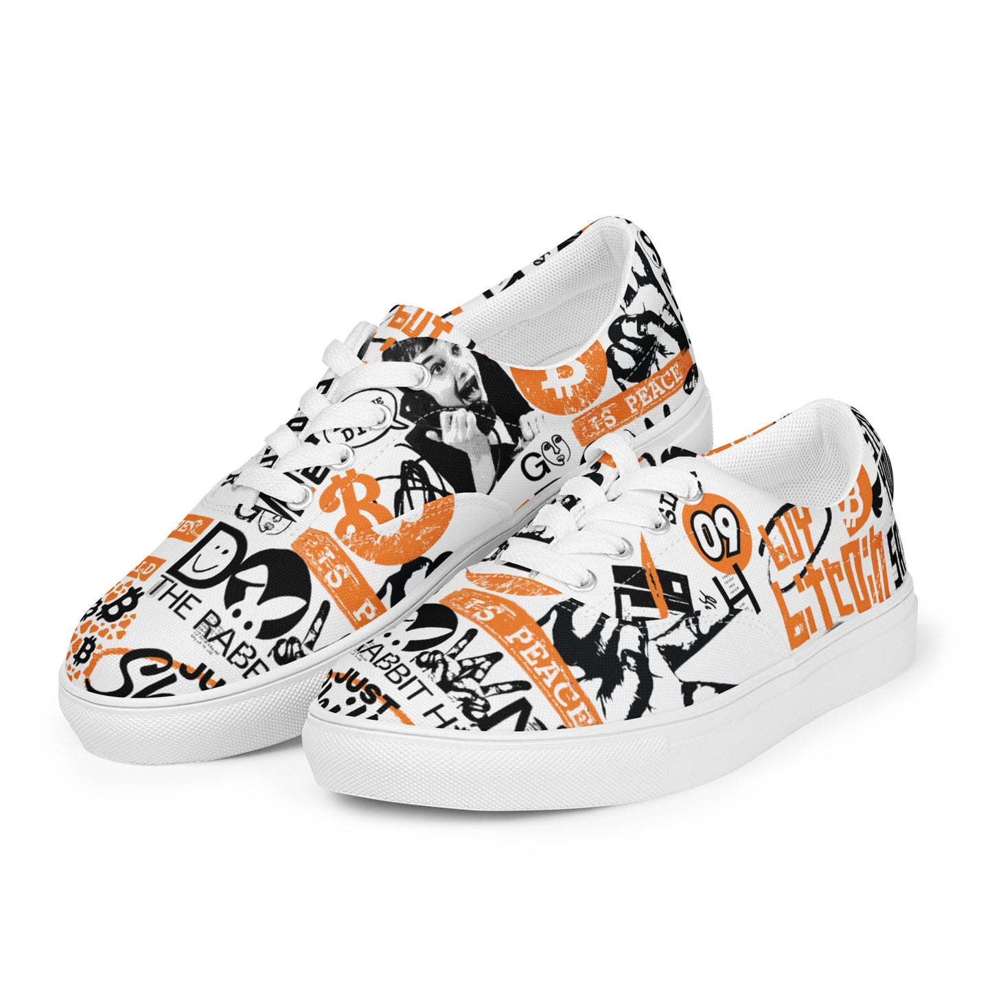 White bitcoin sneakers with black and orange graphics on a white background
