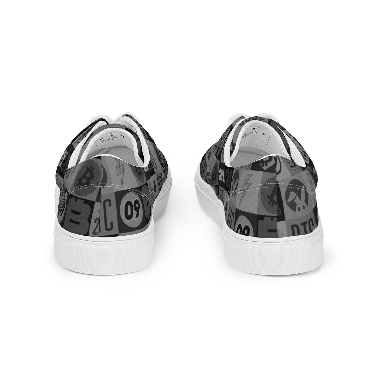 Black and white sneakers with graphic design on a white background
