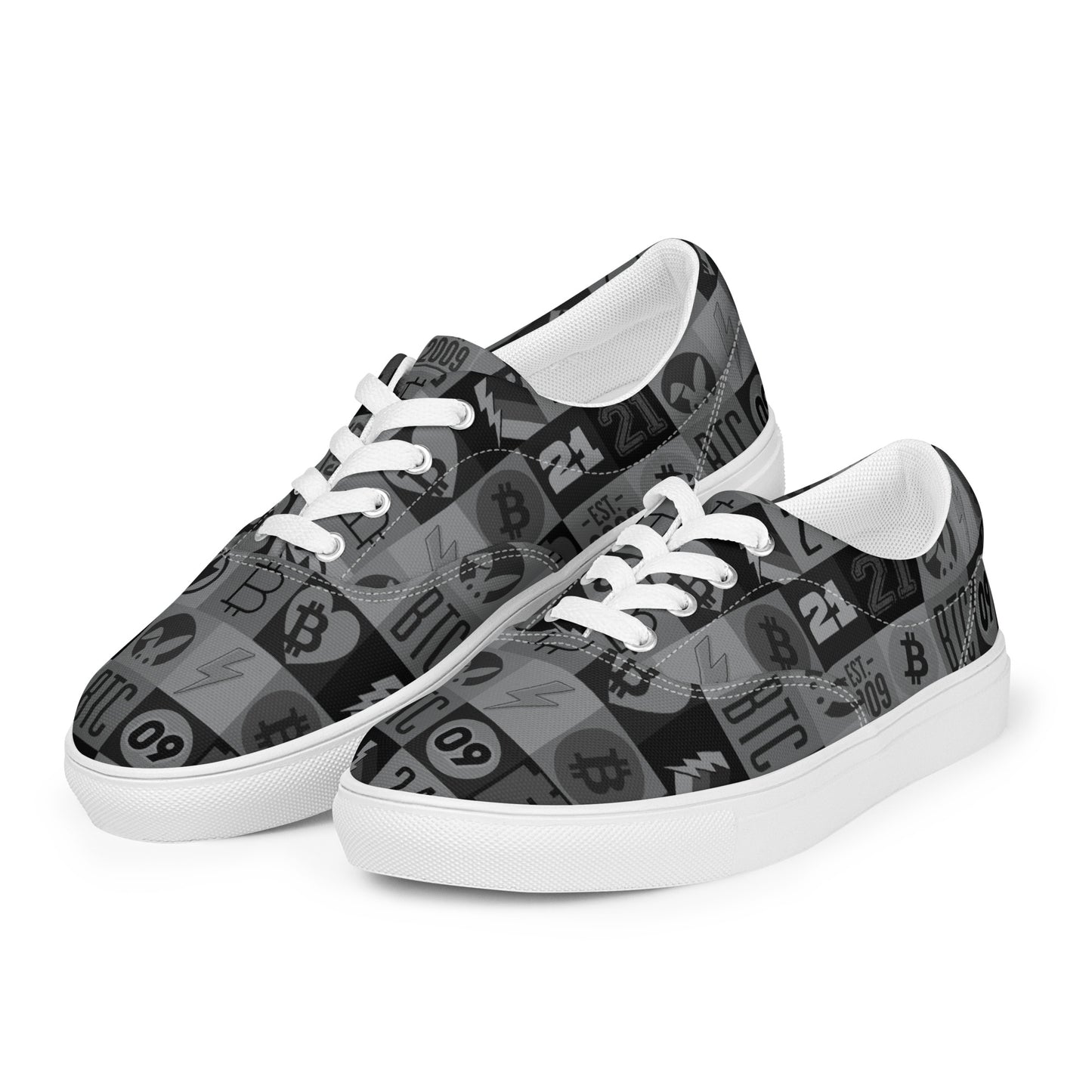 Pair of sneakers with Bitcoin pattern on a white background