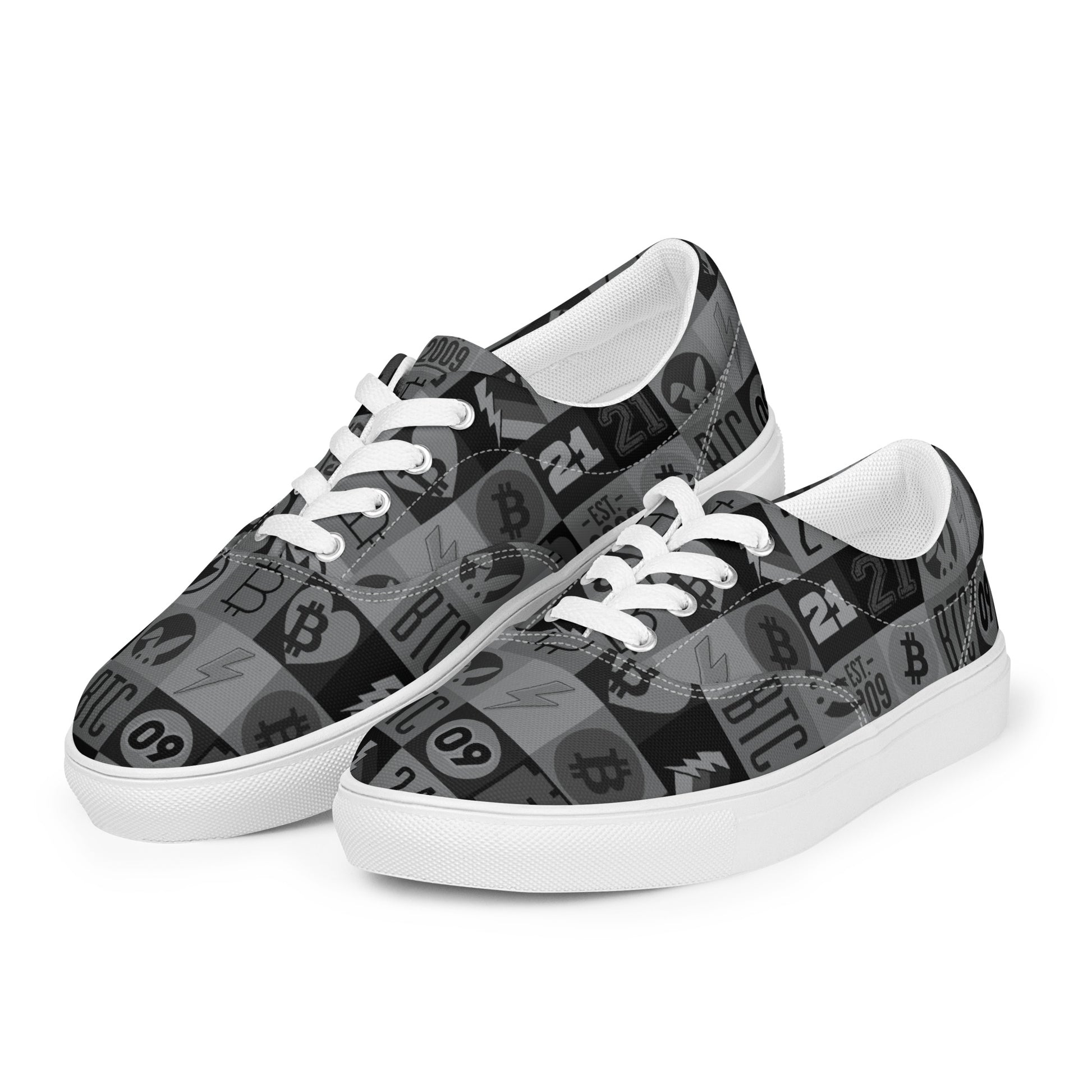 Pair of sneakers with Bitcoin pattern on a white background