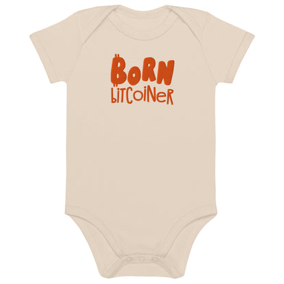 Beige baby onesie with 'Born Bitcoiner' text in orange on a white background
