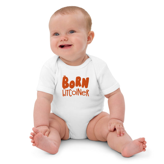Baby wearing a white onesie with 'Born Bitcoiner' text on a white background