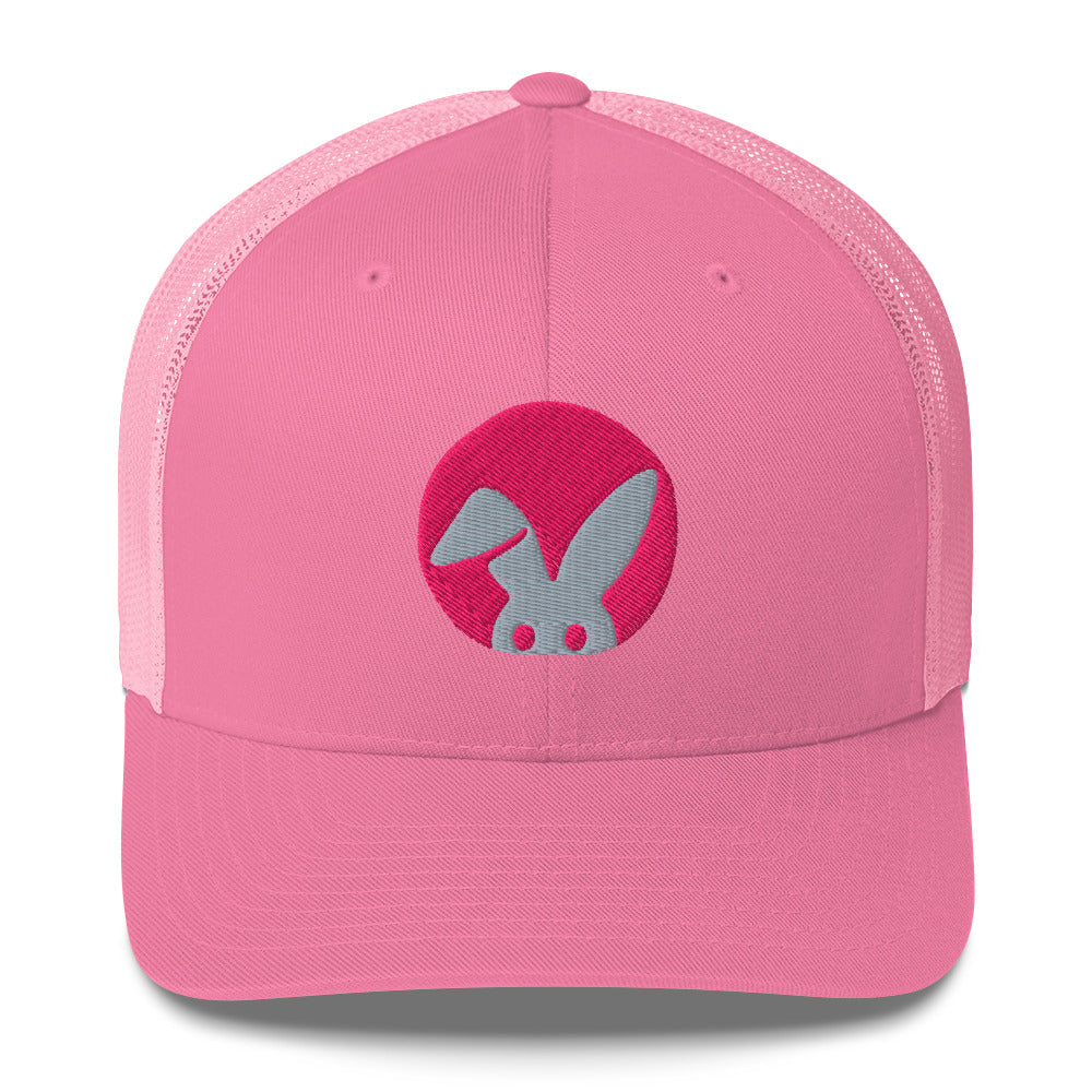 Pink cap with a circular logo featuring a stylized rabbit on a white background