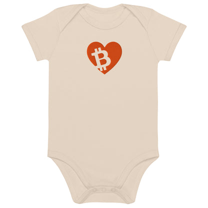 Beige baby onesie with a red heart and Bitcoin symbol on a white background