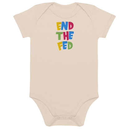 Beige baby onesie with colorful text 'END THE FED' on a white background