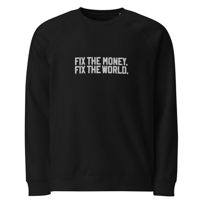 Black sweatshirt with 'FIX THE MONEY. FIX THE WORLD.' text on a white background