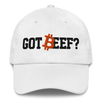White cap with 'GOT BEEF?' text and Bitcoin logo on a white background