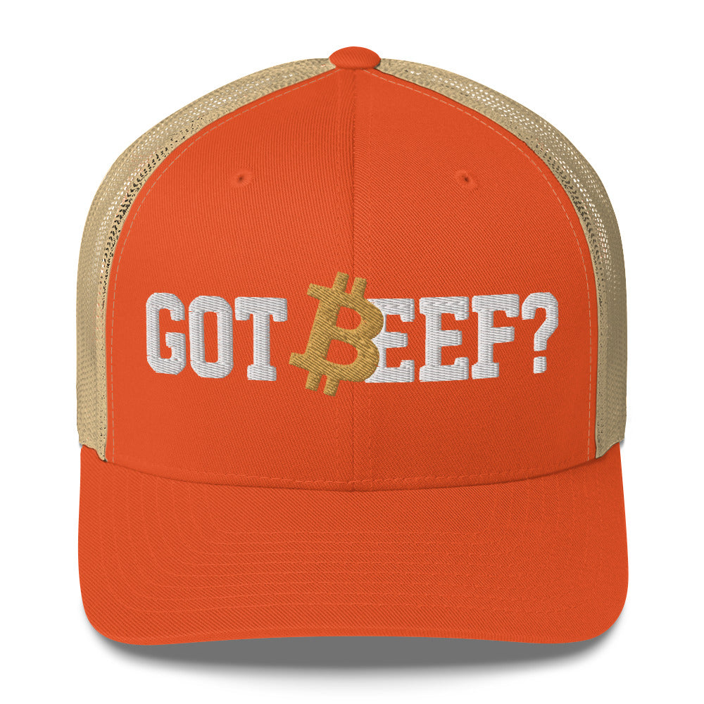 Orange cap with 'GOT BEEF?' bitcoin text and Bitcoin symbol on a white background