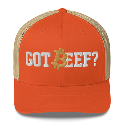 Orange cap with 'GOT BEEF?' bitcoin text and Bitcoin symbol on a white background