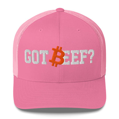 Pink cap with 'GOT BEEF?' bitcoin text and Bitcoin symbol on a white background