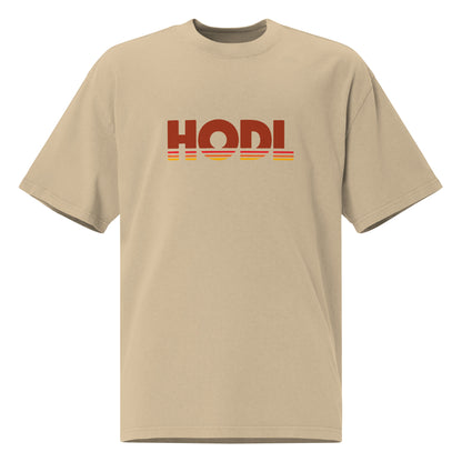 Beige t-shirt with 'HODL' logo on a white background