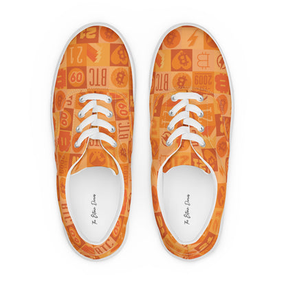 Orange bitcoin sneakers with a pattern on the sole on a white background