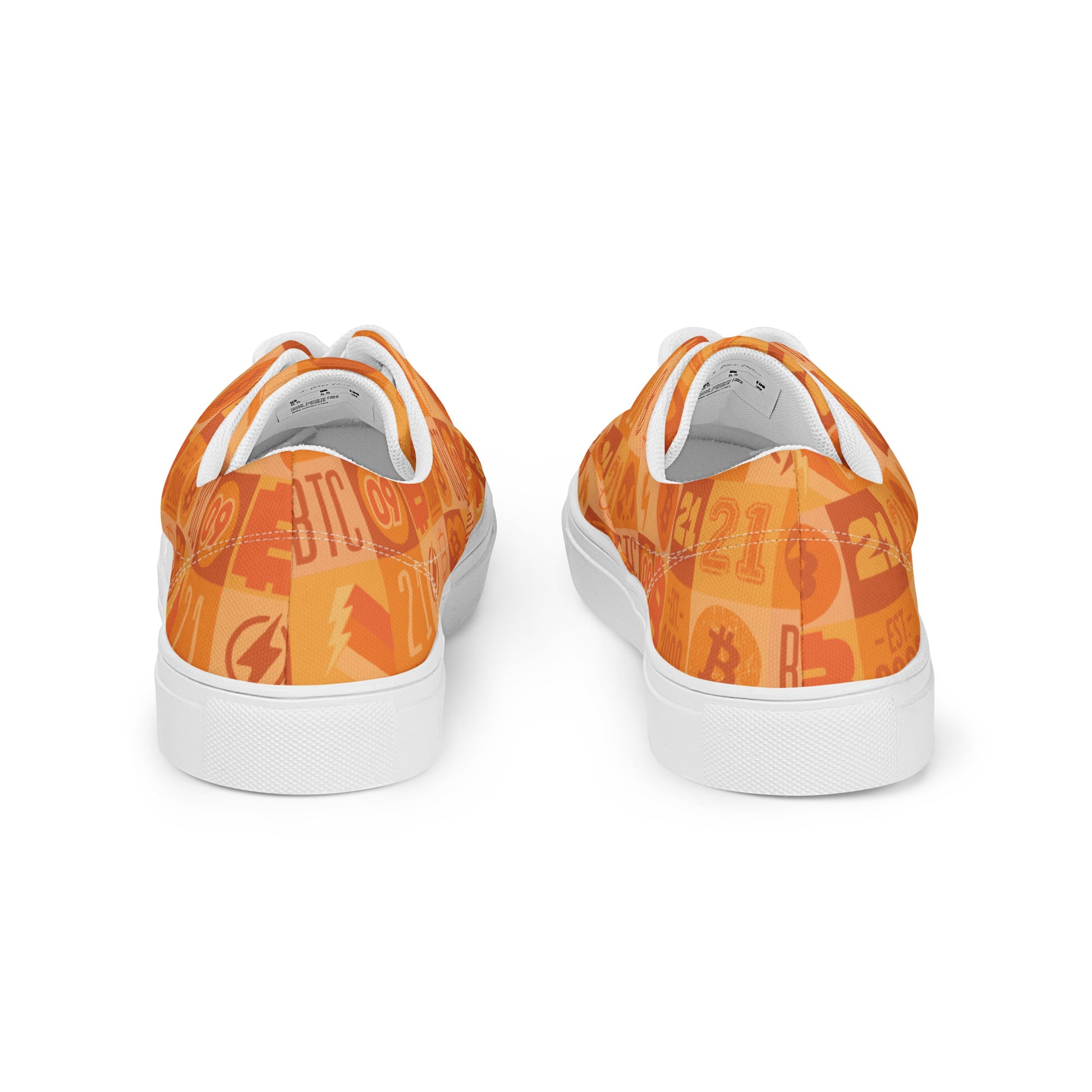 Orange sneakers with a pattern on a white background