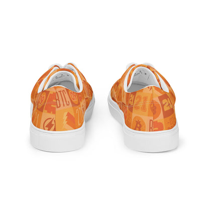 Orange sneakers with a pattern on a white background