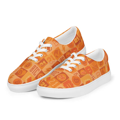 Orange bitcoin sneakers with white laces on a white background