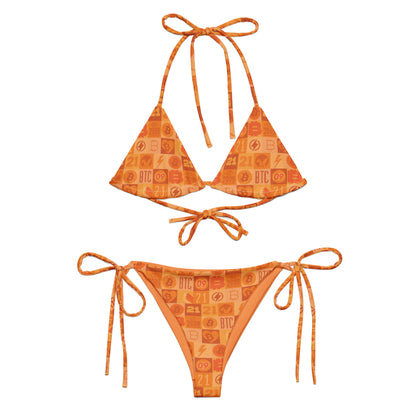 Orange bitcoin patterned bikini set on a white background