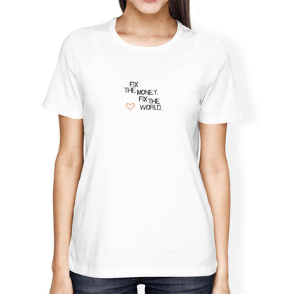 White t-shirt with text 'Fix the money, fix the world' worn by a person on a white background